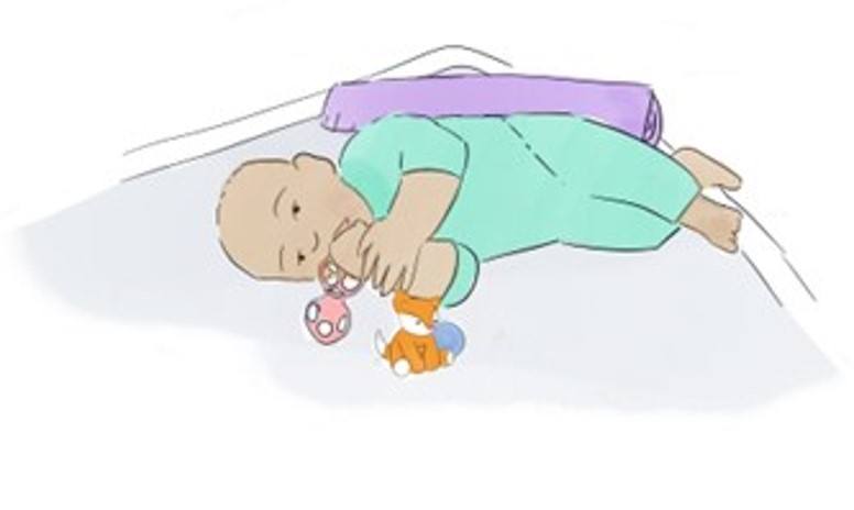 baby lying on right side