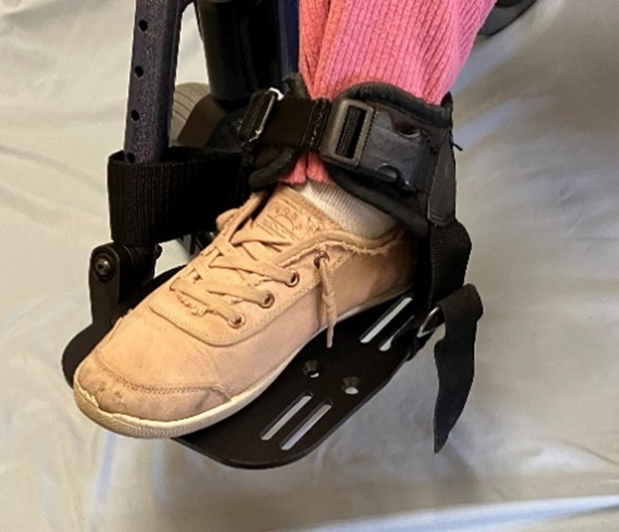 child's foot with strap