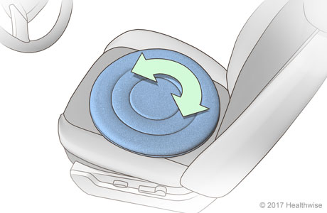 Swivel seat on car seat cushion showing how seat swivels to help someone get in and out of the car. Swivel seat on car seat cushion showing how seat swivels to help someone get in and out of the car.