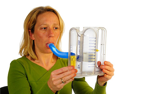 Person taking a slow, deep breath Person taking a slow, deep breath