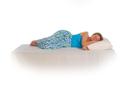 Imágenes de cómo proteger la espalda al acostarse: Paso 3 de 3 - Al acostarse