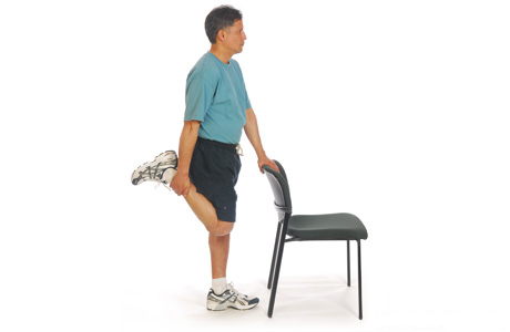 Estiramiento de cuádriceps en posición de pie